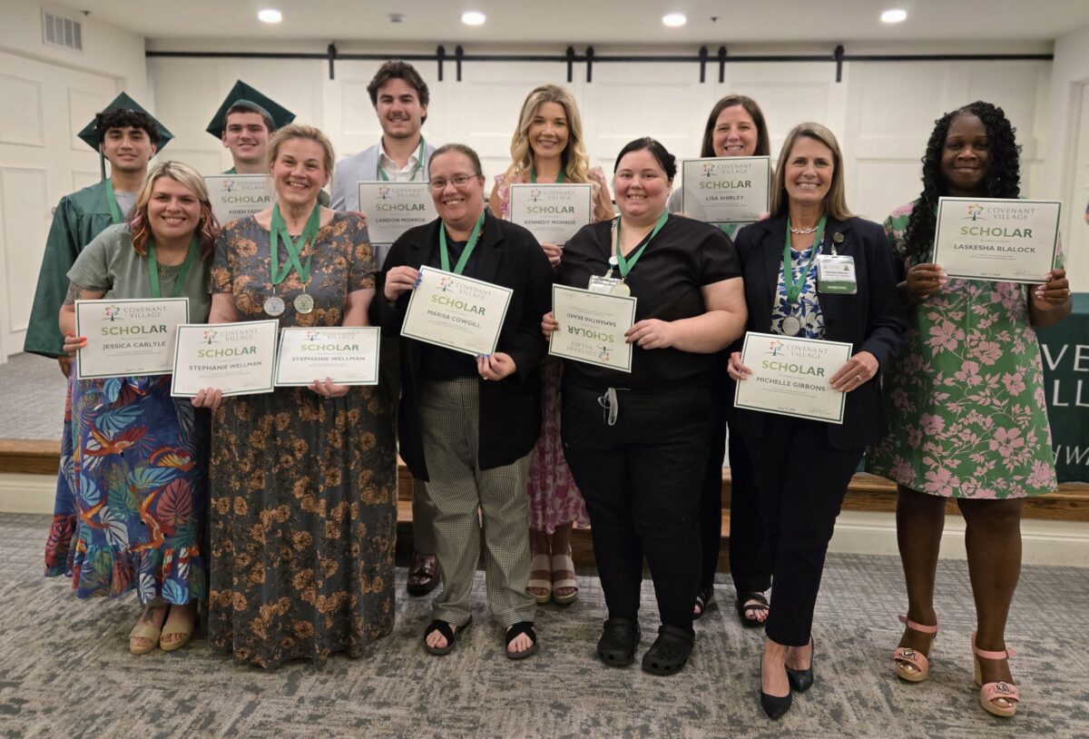 group picture of employees receiving professional development scholarships